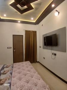 Et tv og/eller underholdning på Green Valley Residency