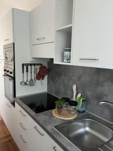 Køkken eller tekøkken på Villa ELISA - appartamento nel cuore del Chianti