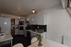 Nhà bếp/bếp nhỏ tại Appartement SANNOIS