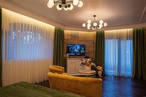 Et tv og/eller underholdning på RUELLE Chateau Boutique