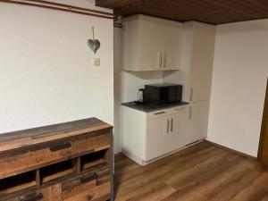 Kuchyň nebo kuchyňský kout v ubytování Jagerhäusl