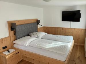 Postel nebo postele na pokoji v ubytování Jagerhäusl