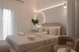 Postel nebo postele na pokoji v ubytování Diogenis Luxury Apartment Sea View