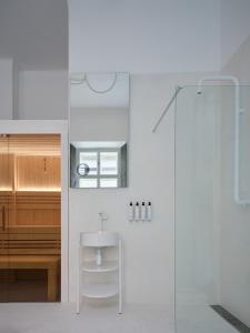 Et badeværelse på donebe boutique hotel & wellness