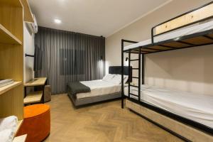 Postel nebo postele na pokoji v ubytování Ein Harod Country Lodge