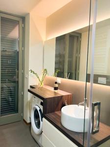 Et badeværelse på Lagrange Turin Suite, Luxury nel Cuore di Torino !