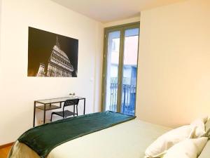 En eller flere senge i et værelse på Lagrange Turin Suite, Luxury nel Cuore di Torino !