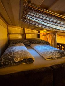 Giường trong phòng chung tại APApartment +3 ảnh