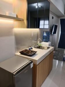 Køkken eller tekøkken på City View Studio Apartement South Surabaya