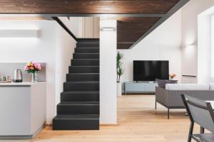 Et tv og/eller underholdning på Volta Luxury Collection