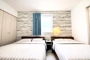 En eller flere senge i et værelse på 優富良野