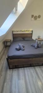 En eller flere senge i et værelse på T2 Cosy - Coeur Amiens