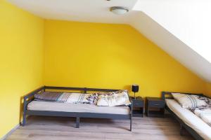 En eller flere senge i et værelse på Haus in Düren mit 4 Zimmer und Balkon