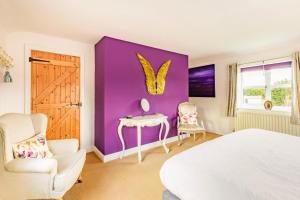 Et tv og/eller underholdning på Willow Cottage by Leap Escapes