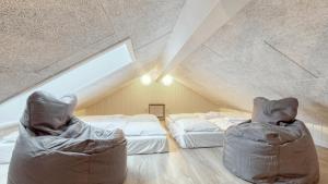 En eller flere senge i et værelse på Villavilla #760 - Trams Am See, Deutschland