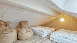 En eller flere senge i et værelse på Villavilla #766 - Trams Am See, Deutschland