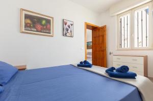 Giường trong phòng chung tại Marebello by BarbarHouse