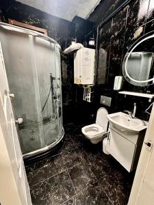 Phòng tắm tại Golden Taksim Kent Apart Hotel +4 ảnh