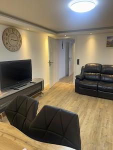 TV/trung tâm giải trí tại Ruhiges Apartment nähe Lübeck - Ostsee