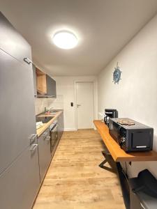 Nhà bếp/bếp nhỏ tại Ruhiges Apartment nähe Lübeck - Ostsee
