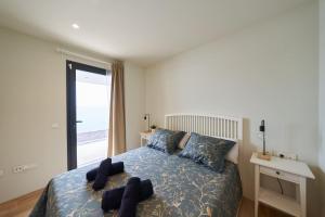 En eller flere senge i et værelse på Casa Surya + 116 billeder