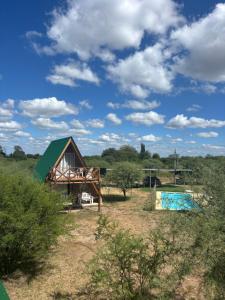 a view of a tent and a swimming pool at Complejo Ayün in Travesía