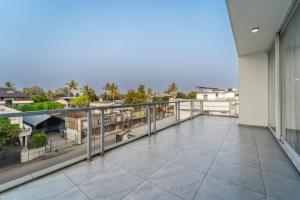 Μπαλκόνι ή βεράντα στο G Square 1 Room with Private Balcony Near Alappuzha Beach & Other Popular Attractions