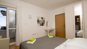 Postel nebo postele na pokoji v ubytování Villa Mandina - Makarska by Villas Guide + 23 fotografií