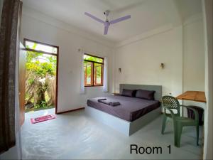 Posezení v ubytování Bird garden Midigama + 14 fotografií