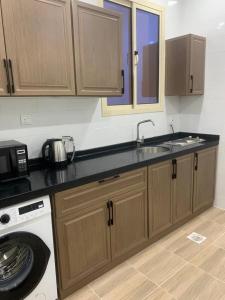 Kuchyň nebo kuchyňský kout v ubytování شقة انيقة