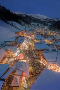 an aerial view of a town at night with a church at TUX DIAMANT in Tux +2 photos