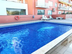 Swimmingpoolen hos eller tæt på 4AO Brisa Mar - Casas & Papeis