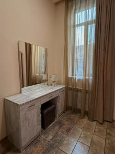 a room with a large mirror on the wall at H Resort Hotel Vagharshapat Armenia in Vagharshapat +113 photos