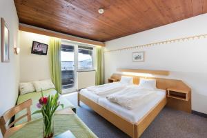 Letto o letti in una camera di Hotel Linde