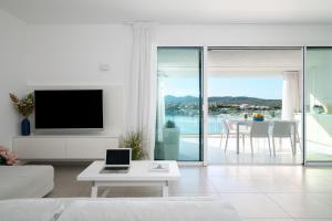 Et tv og/eller underholdning på Appartamenti Aironi - Your House in Sardinia