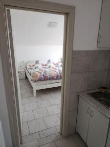 Ένα ή περισσότερα κρεβάτια σε δωμάτιο στο PAR