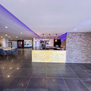 an empty lobby with a bar and a kitchen at Sea View Villa فيلا إطلالة بحرية in Jeddah +191 photos