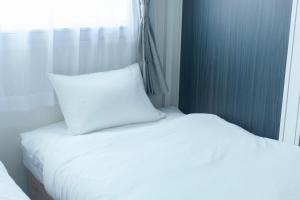 En eller flere senge i et værelse på A-Mami 315