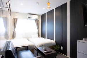 En eller flere senge i et værelse på A-Mami 315 + 77 billeder