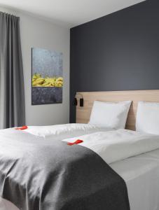 Postel nebo postele na pokoji v ubytování Citybox Bergen City