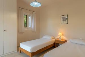 En eller flere senge i et værelse på Lenika Residence + 25 billeder