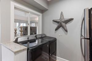 Kuchyň nebo kuchyňský kout v ubytování TP4937: 4937 Turtle Point + 28 fotografií