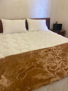 En eller flere senge i et værelse på Studio moderne avec parking ascenseur -Maarif Centre