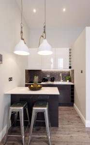 Køkken eller tekøkken på Stunning ground floor studio 5 min to tube