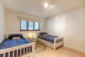 a bedroom with two beds and a window at 3 Bed in Croyde oc-t30753 in Croyde