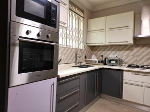 Køkken eller tekøkken på Kadny Villa