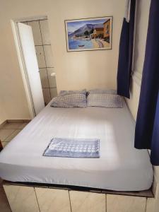 En eller flere senge i et værelse på Pousada vittoria