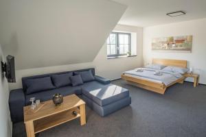 En eller flere senge i et værelse på Penzion pod Radhoštěm u Maléřů