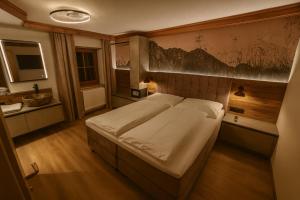 Postel nebo postele na pokoji v ubytování Appartments Kasermandl