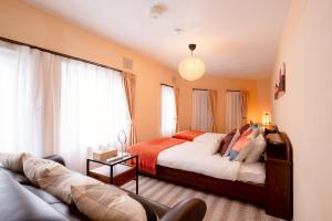 Giường trong phòng chung tại Powder Snow 粉雪